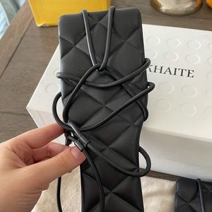 Khaite Patras Black Leather Sandals, 37.5 EU
